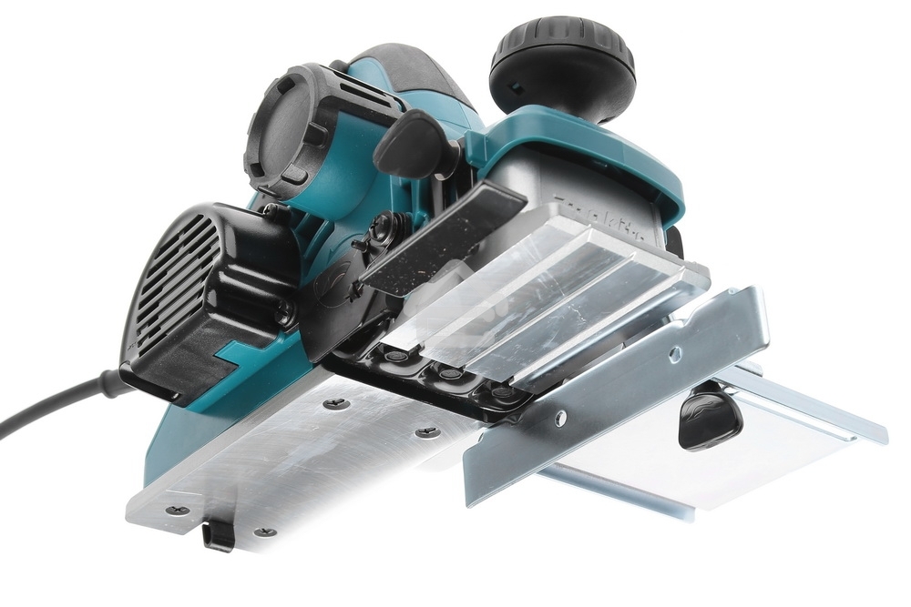 Рубанок Makita KP0810C Рубанок,1050Вт,12000об\м,ширина-82мм,глуб-4мм,3.2кг,кор,парал упор
