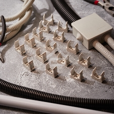 Крепеж-клипса для монтажного пистолета Rexant Ø 25 мм, серая (50 шт/уп)